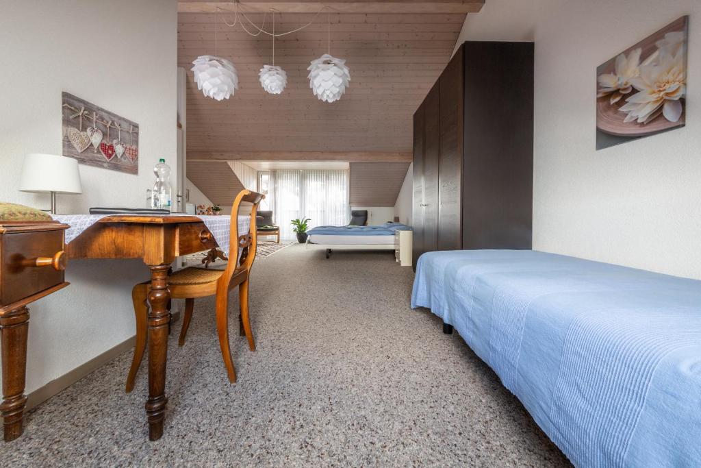 Postel nebo postele na pokoji v ubytování MyBednBreakfast in Bottmingen