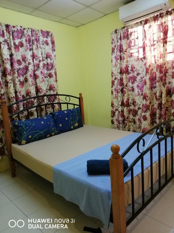 Postel nebo postele na pokoji v ubytování LAYLA INN