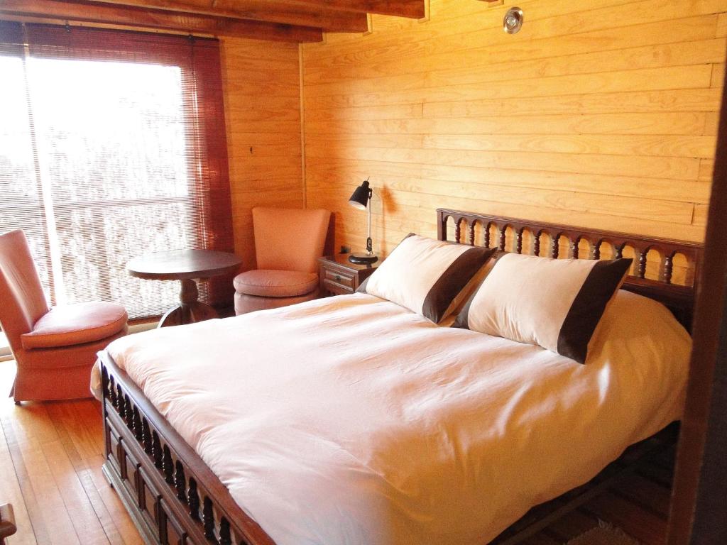 Postel nebo postele na pokoji v ubytování Lodge Colbún
