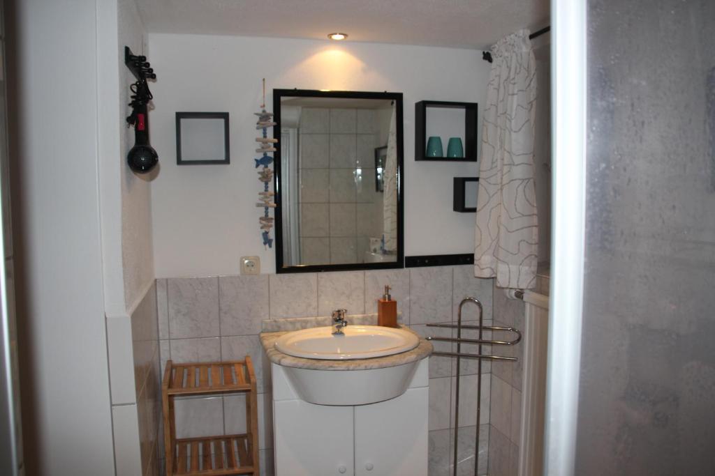 Ein Badezimmer in der Unterkunft Haus Mauken - Appartments mit Panoramablick