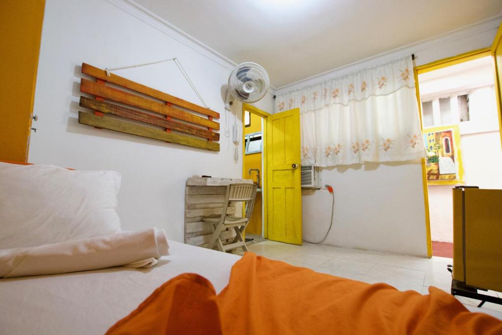 Voodi või voodid majutusasutuse QuillaHost Guesthouse toas