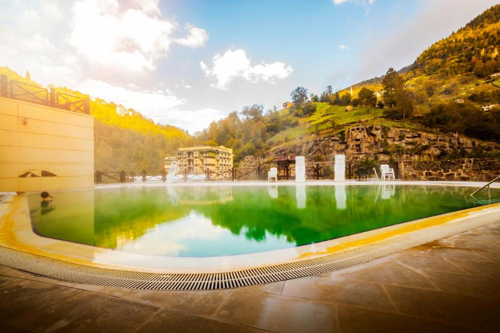 Bazén v ubytování Ridos Thermal Hotel & Spa nebo v jeho okolí
