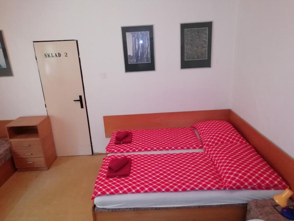 Postel nebo postele na pokoji v ubytování Penzion Rudolfovna