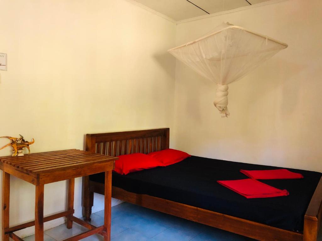 Postel nebo postele na pokoji v ubytování Dambulla City Hostel