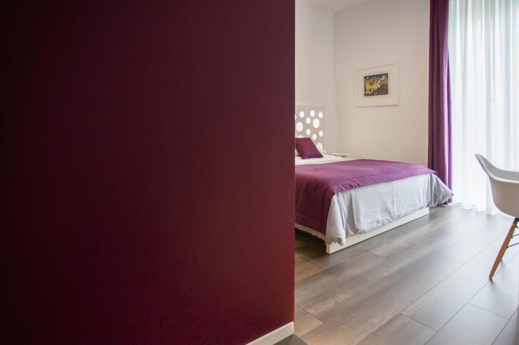 Postel nebo postele na pokoji v ubytování Dimora Mefite-Camere con Bagno Privato e Self check-in