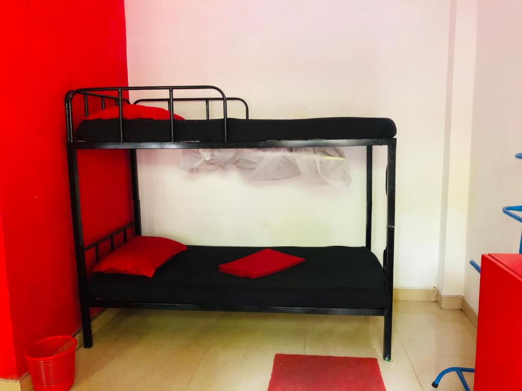 Postel nebo postele na pokoji v ubytování Dambulla City Hostel