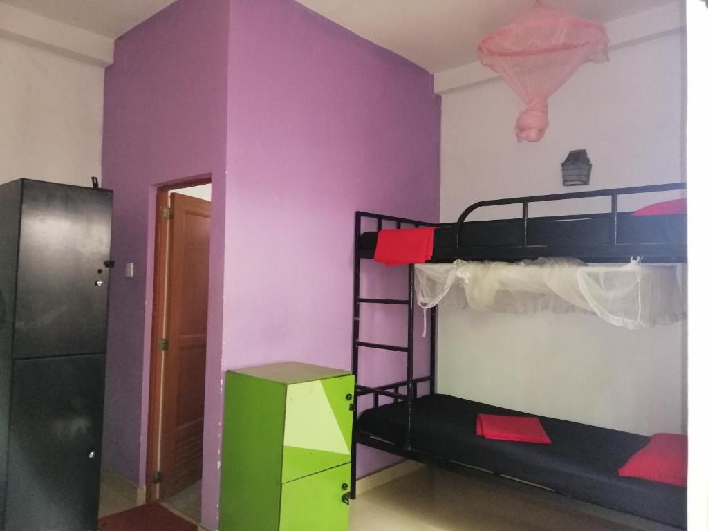 Postel nebo postele na pokoji v ubytování Dambulla City Hostel