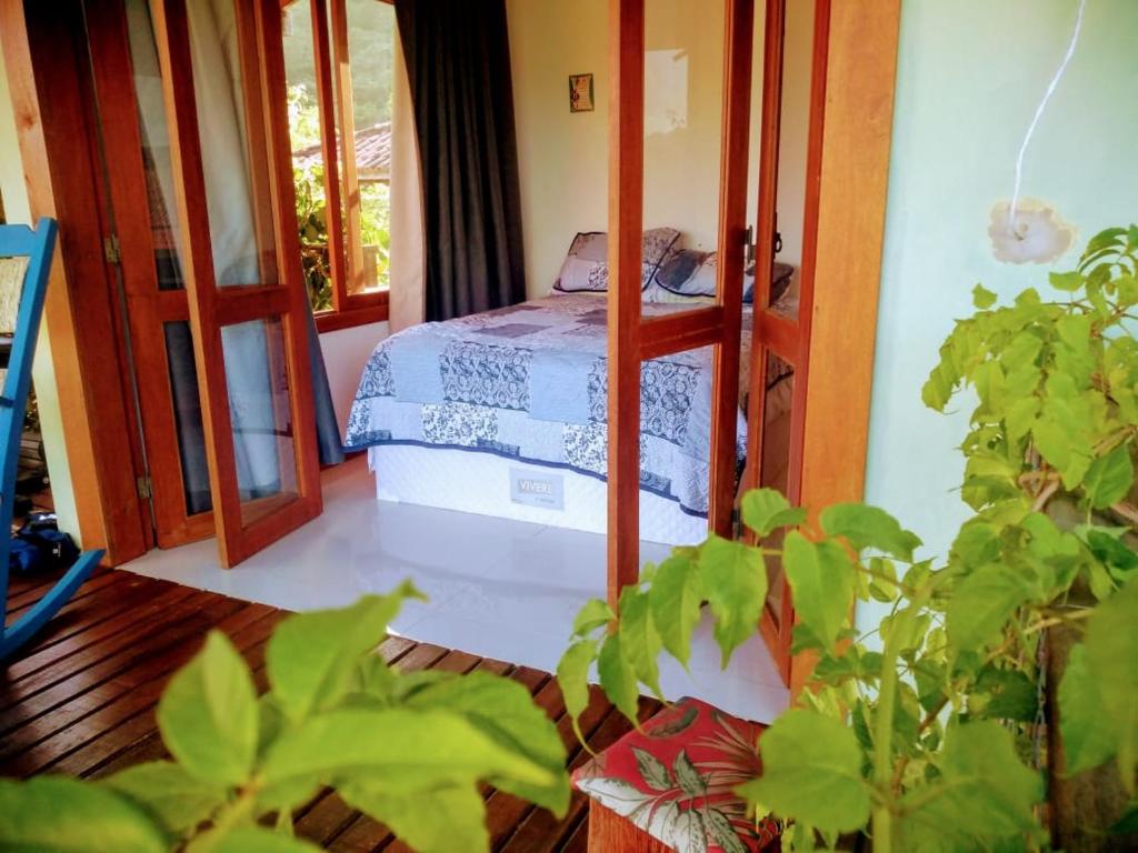  Casa com trilha pra praia e linda vista para Lagoa da Conceição