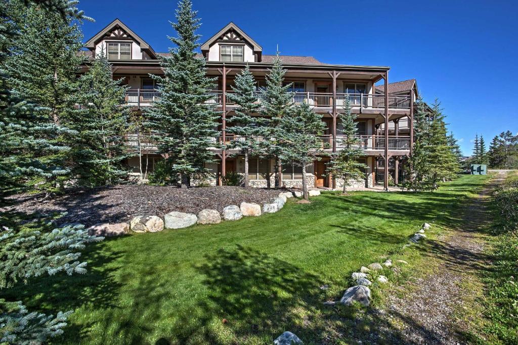 a large house with a yard in front of it at Mountain Condo Half Mi to Breckenridge Ski Slopes in Breckenridge