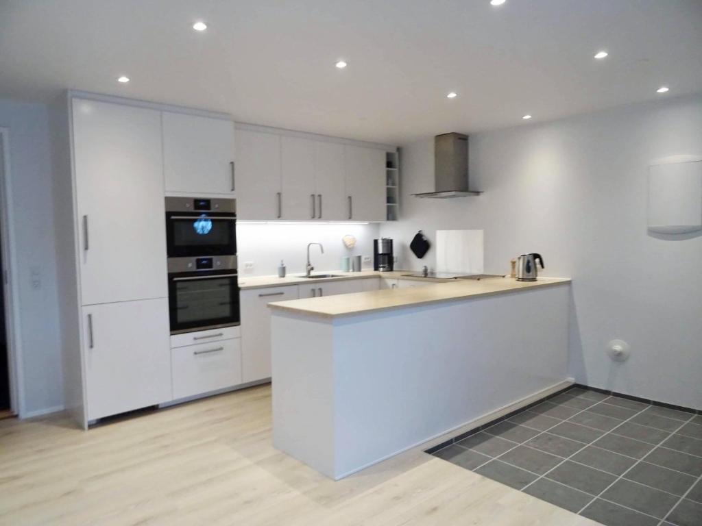 Η κουζίνα ή μικρή κουζίνα στο Modern apartment near the centre of Tórshavn