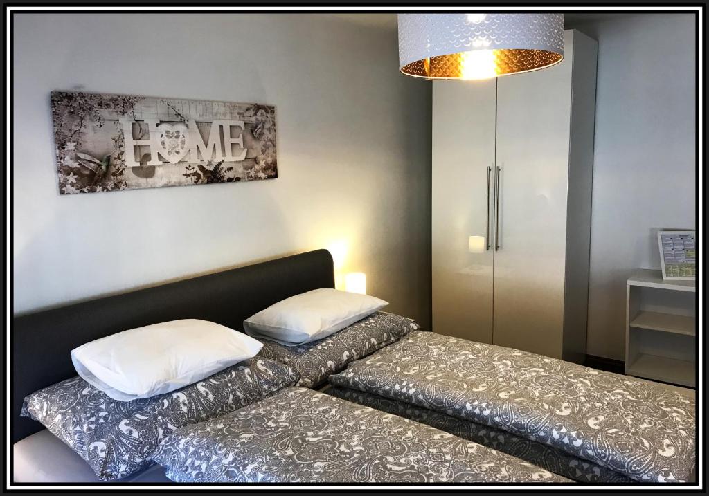Postel nebo postele na pokoji v ubytování Sankt Veit Apartment