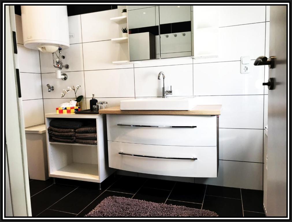 Kuchyň nebo kuchyňský kout v ubytování Sankt Veit Apartment