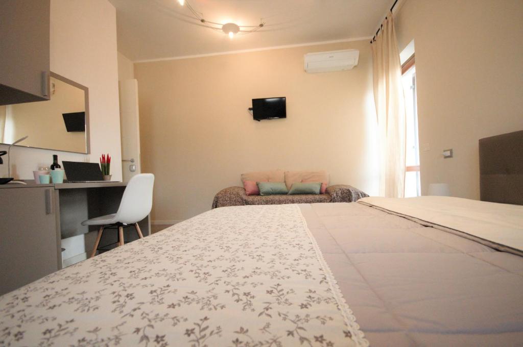 Televízia a/alebo spoločenská miestnosť v ubytovaní ValpoHome&Rooms