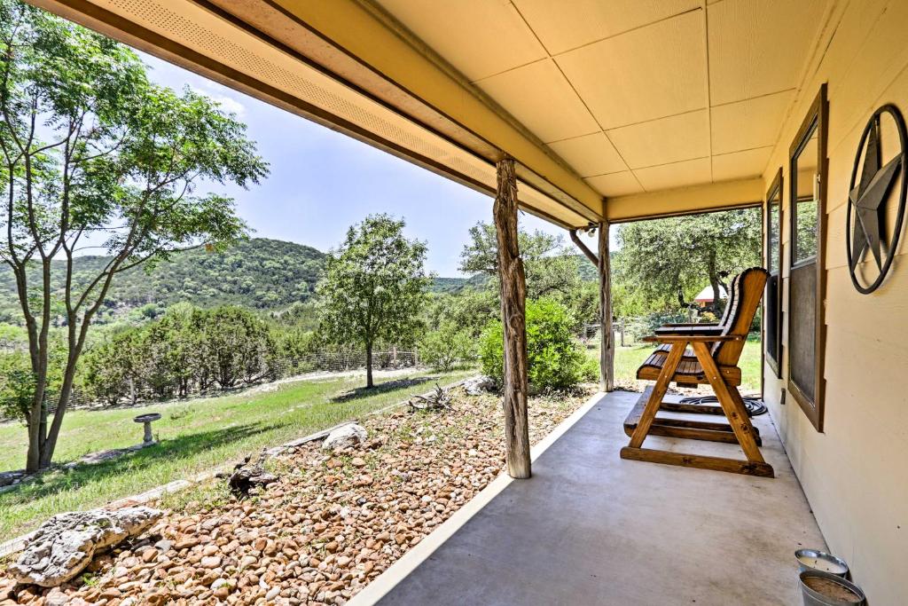 a screened porch with a view of the mountains at Cozy Medina Cottages with Patio and Mountain Views! in Medina