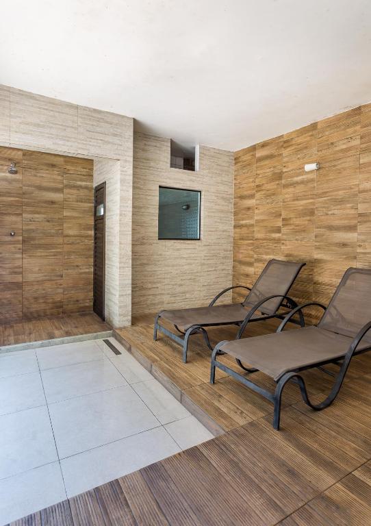 TV a/nebo společenská místnost v ubytování Apart Hotel Porto Príncipe