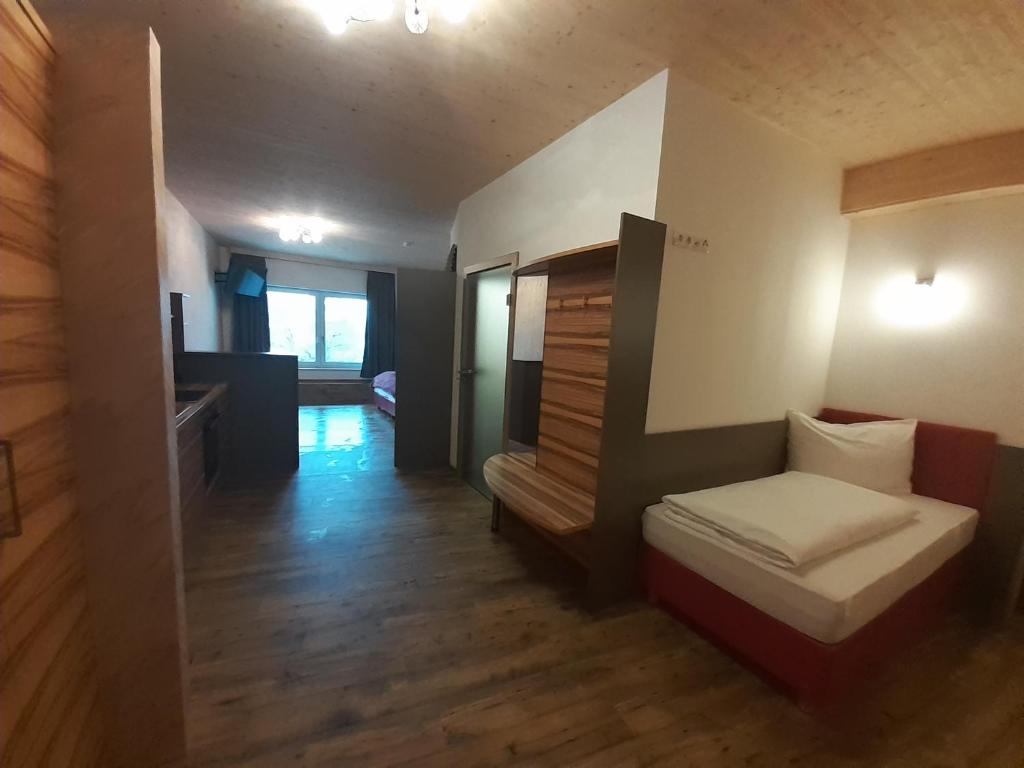Postel nebo postele na pokoji v ubytování Harrauer´s Living