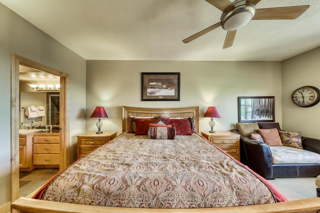 a bedroom with a bed and a ceiling fan at Brian Head Lodge #3307 in Brian Head