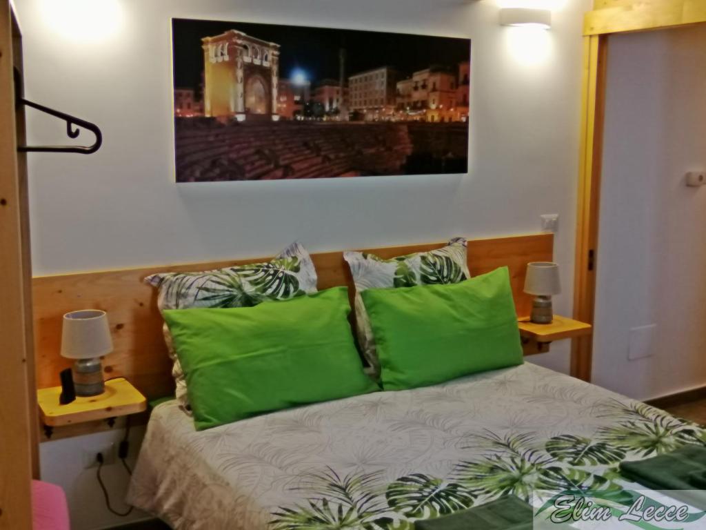Postel nebo postele na pokoji v ubytování Elim Suite & Rooms