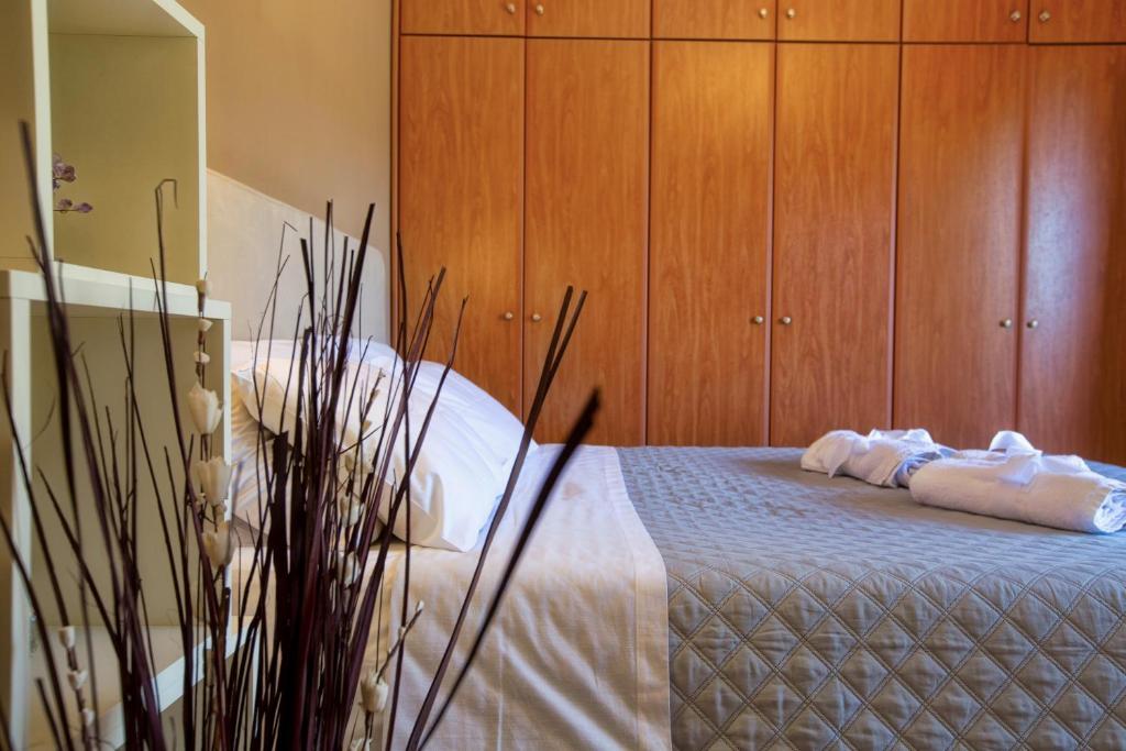 Postel nebo postele na pokoji v ubytování The Olive Grove Apartments by Konnect, Dasia