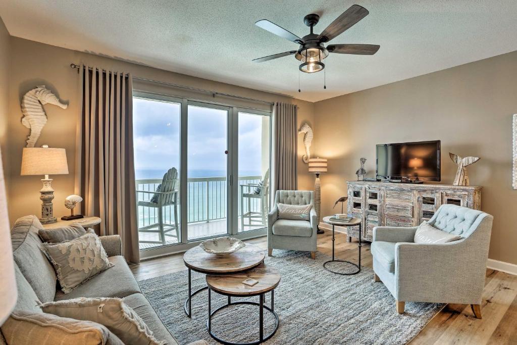 a living room with a view of the ocean at Resort Pool, Gym & Hot Tub: Beachfront PCB Condo! in Panama City Beach