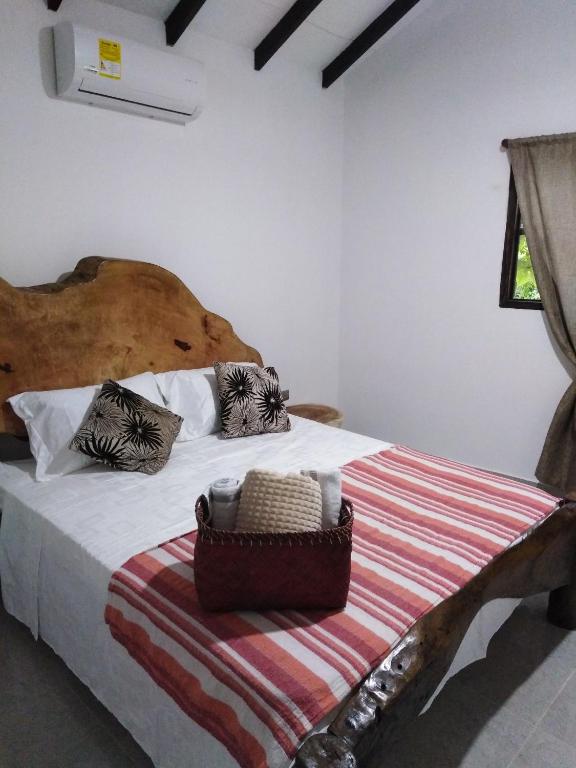 Postel nebo postele na pokoji v ubytování Monte Verde Hostal
