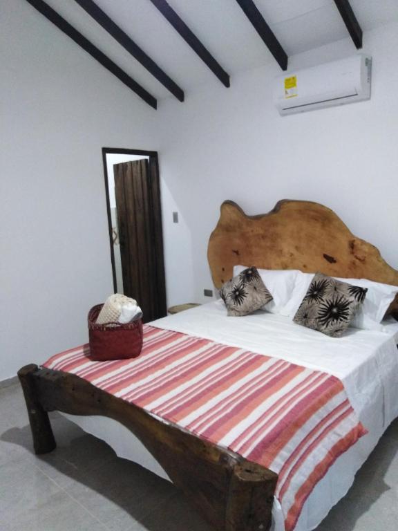 Postel nebo postele na pokoji v ubytování Monte Verde Hostal