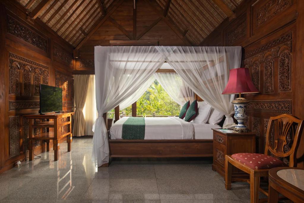 Postel nebo postele na pokoji v ubytování Ayung Resort Ubud
