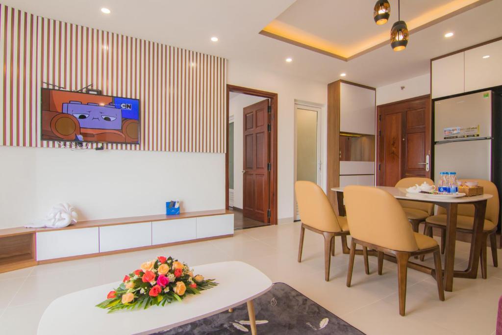 TV a/nebo společenská místnost v ubytování Mermaid Seaside Hotel