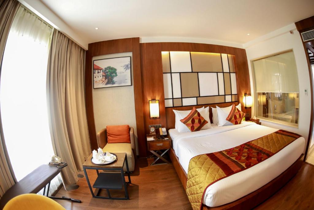 Postel nebo postele na pokoji v ubytování Hotel Span International