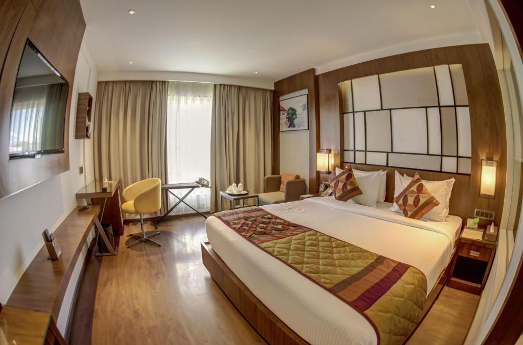 Postel nebo postele na pokoji v ubytování Hotel Span International