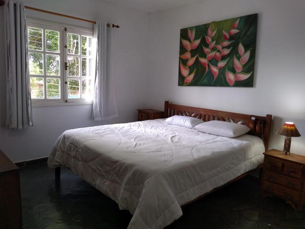  Casa ampla com ar condicionado e churrasqueira