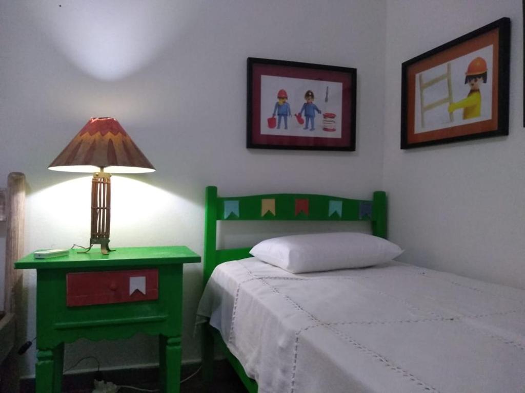  Casa ampla com ar condicionado e churrasqueira