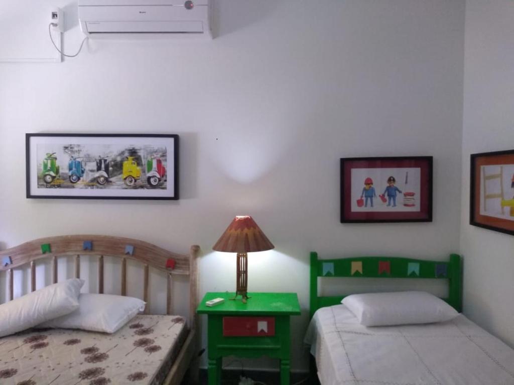  Casa ampla com ar condicionado e churrasqueira