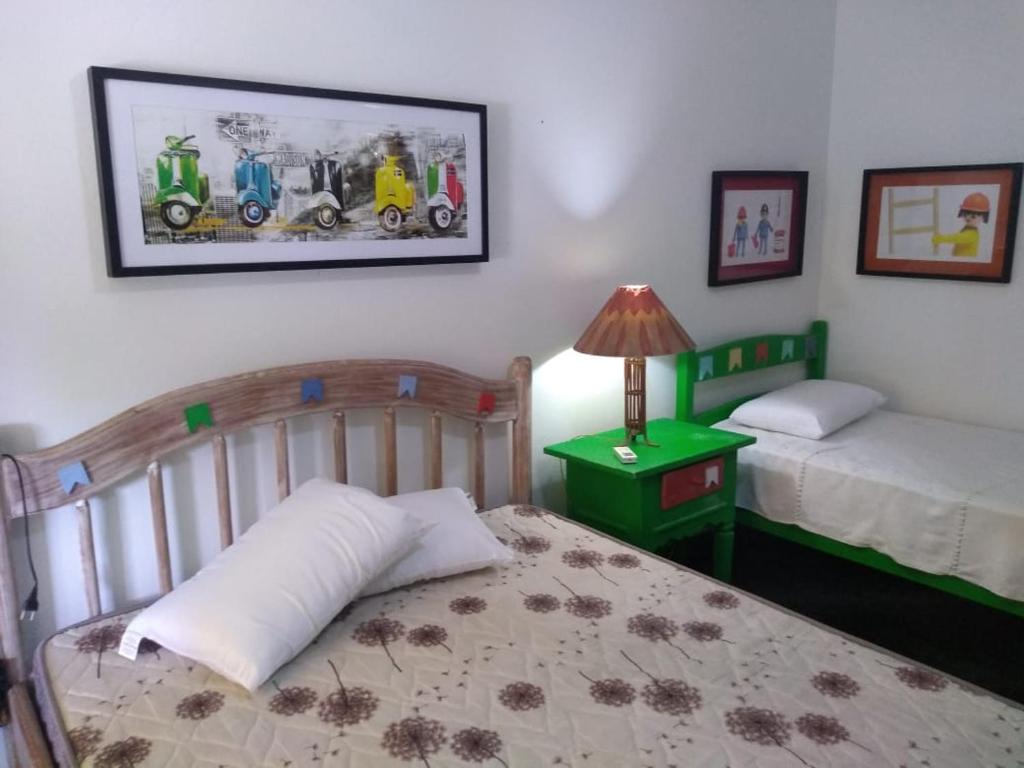  Casa ampla com ar condicionado e churrasqueira