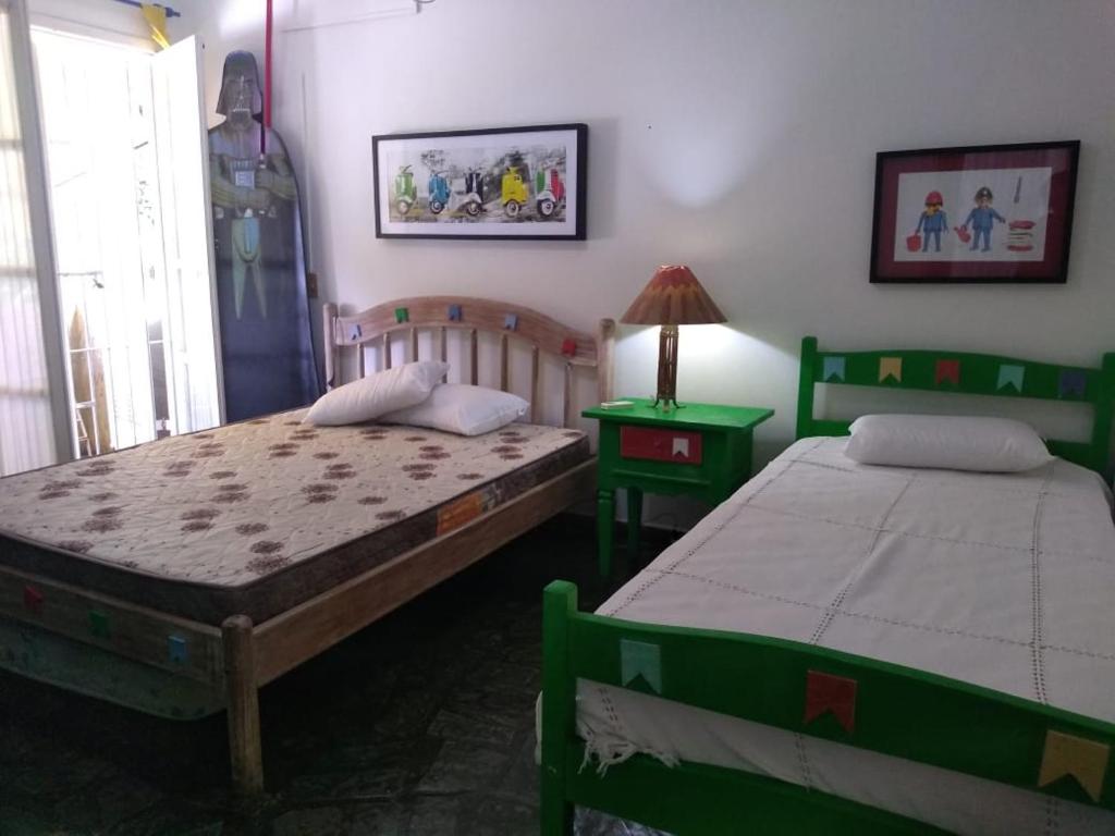  Casa ampla com ar condicionado e churrasqueira