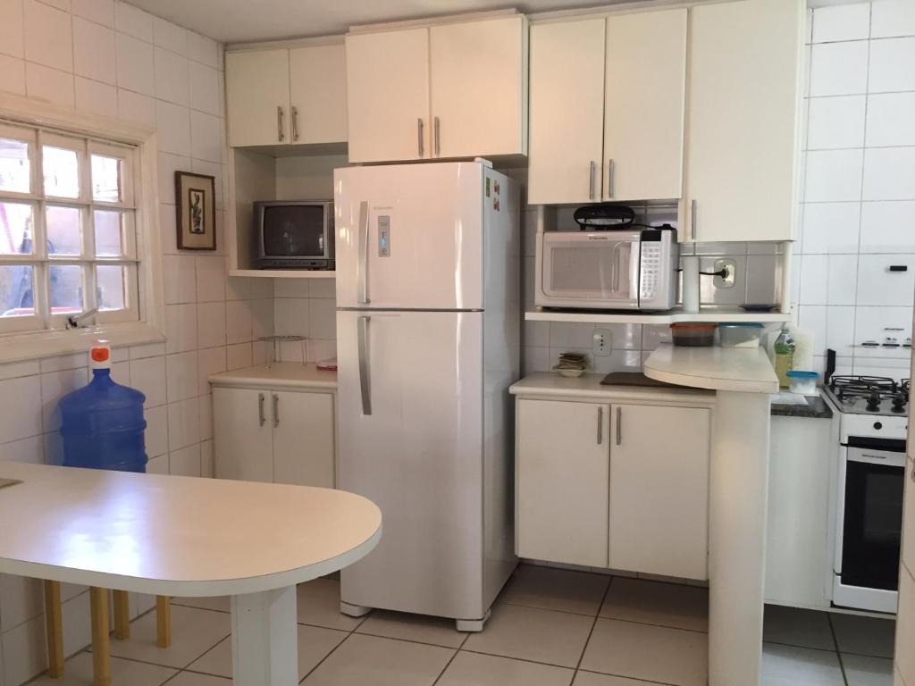  Casa ampla com ar condicionado e churrasqueira