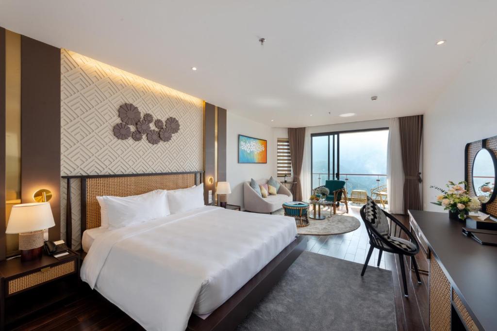 Giường trong phòng chung tại KK Sapa Hotel