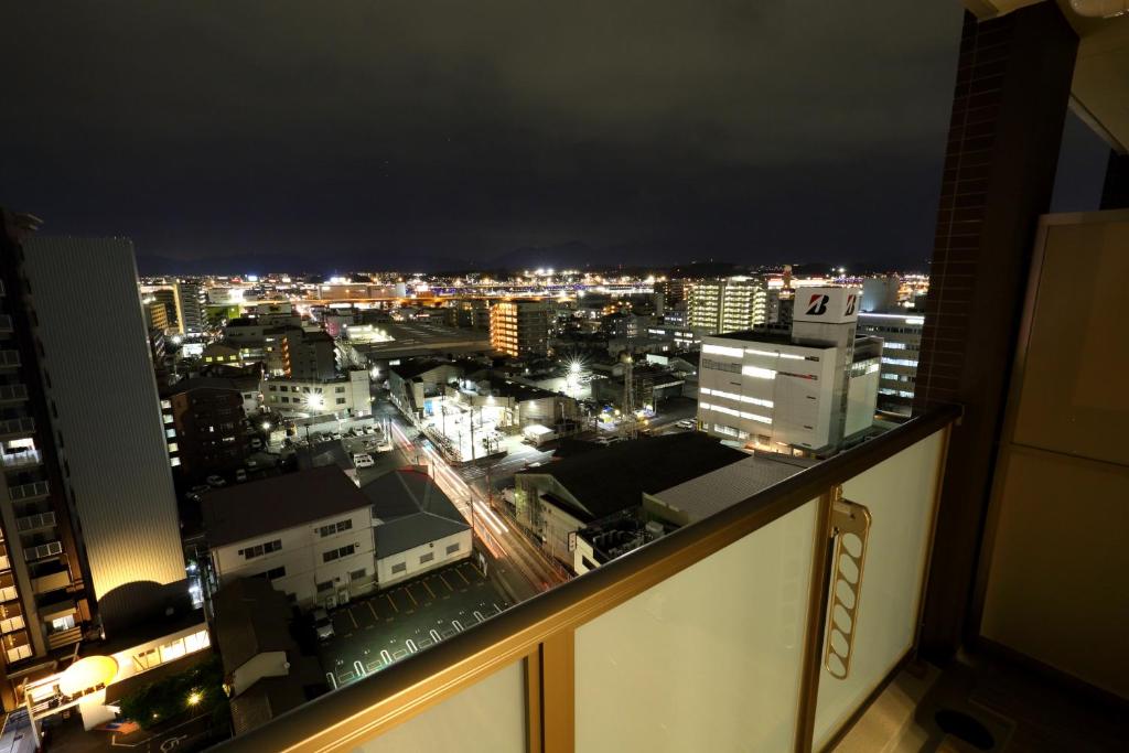 Nespecifikovaný výhled na destinaci Fukuoka nebo výhled na město při pohledu z aparthotelu