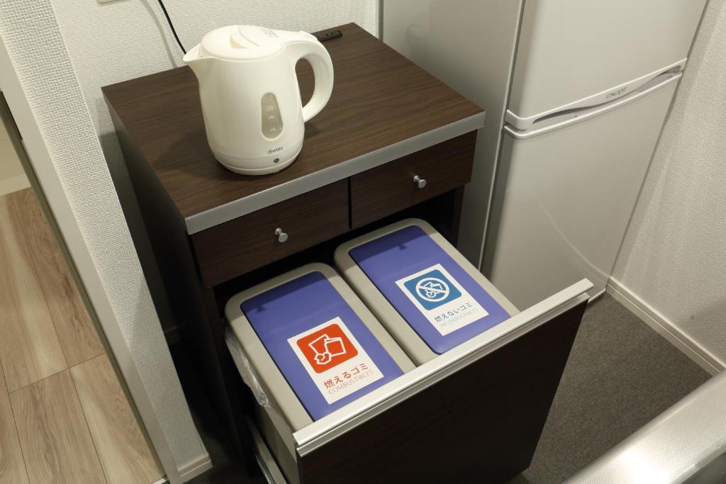 Příslušenství pro přípravu čaje a kávy v ubytování The Grand Residence Hotel Hakata