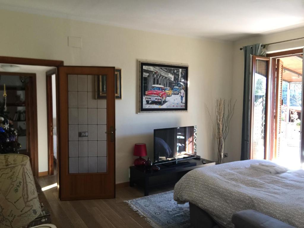 Posteľ alebo postele v izbe v ubytovaní casa Ruggy