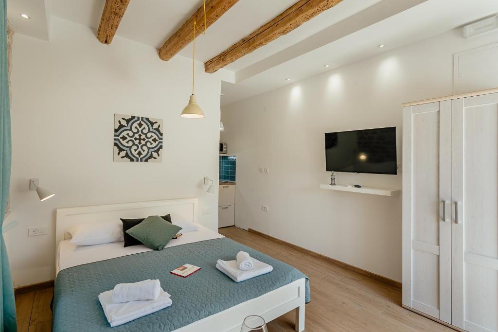 Krevet ili kreveti u jedinici u okviru objekta Conborgo Apartments