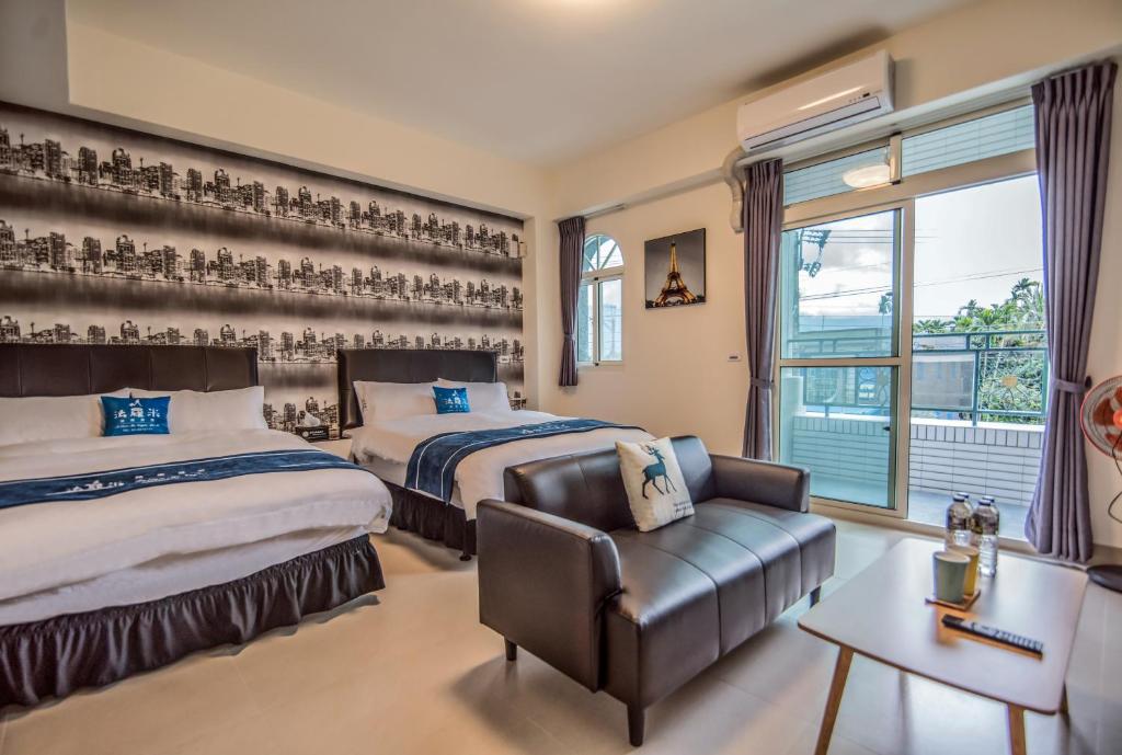 Postel nebo postele na pokoji v ubytování Follow Me Vogue Homestay
