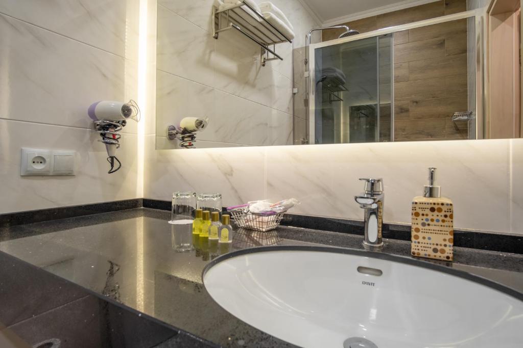 Koupelna v ubytování Boomerang Boutique Hotel
