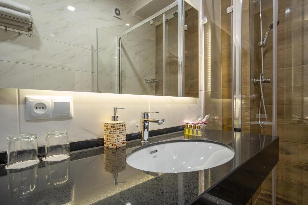 Koupelna v ubytování Boomerang Boutique Hotel
