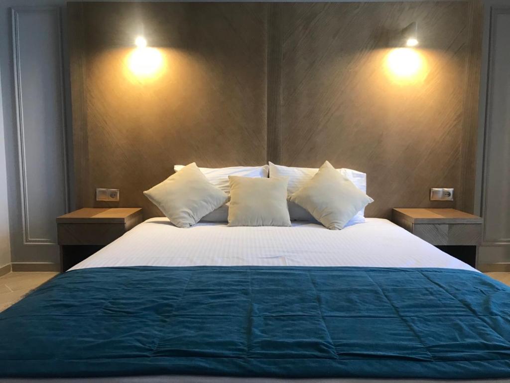 Postel nebo postele na pokoji v ubytování Boomerang Boutique Hotel