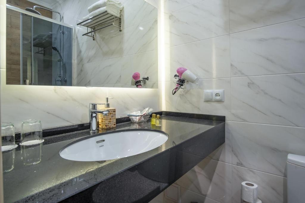 Koupelna v ubytování Boomerang Boutique Hotel