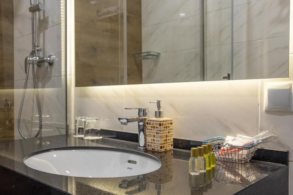 Koupelna v ubytování Boomerang Boutique Hotel
