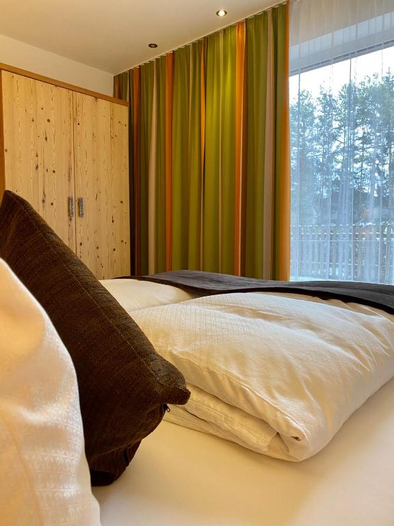 Llit o llits en una habitació de Apart-Elisabeth