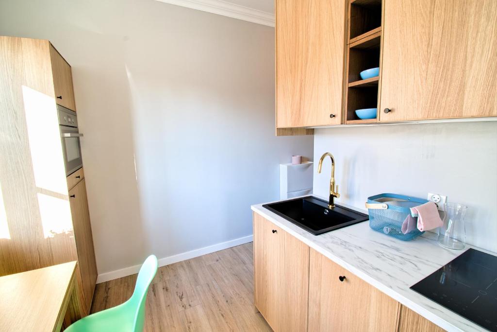 Kuchyňa alebo kuchynka v ubytovaní City Life Apartments Kraków