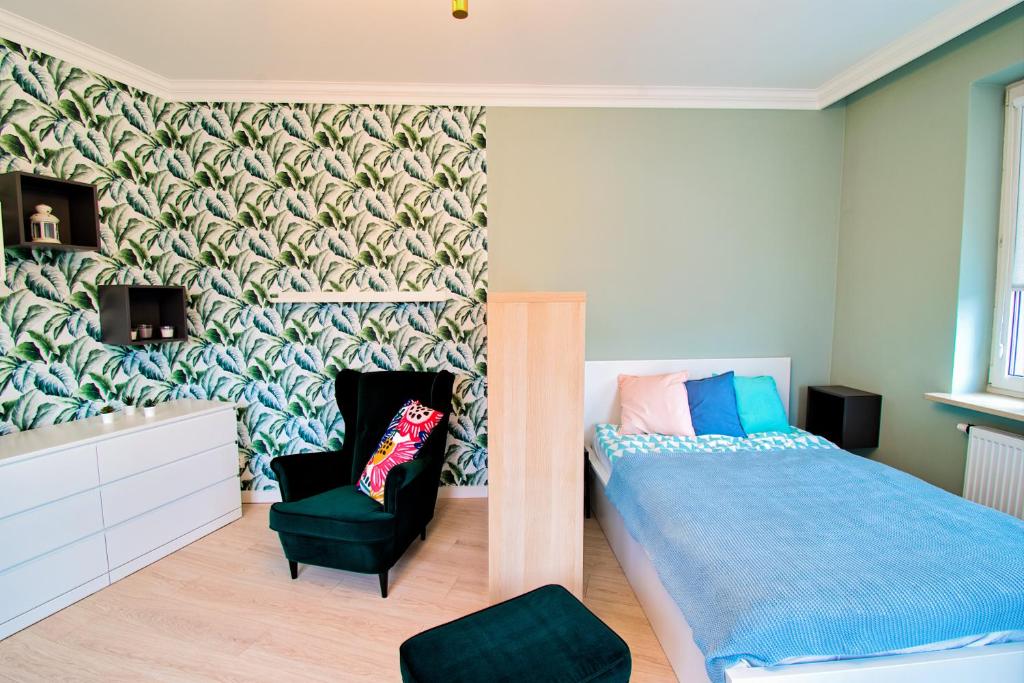 Posteľ alebo postele v izbe v ubytovaní City Life Apartments Kraków